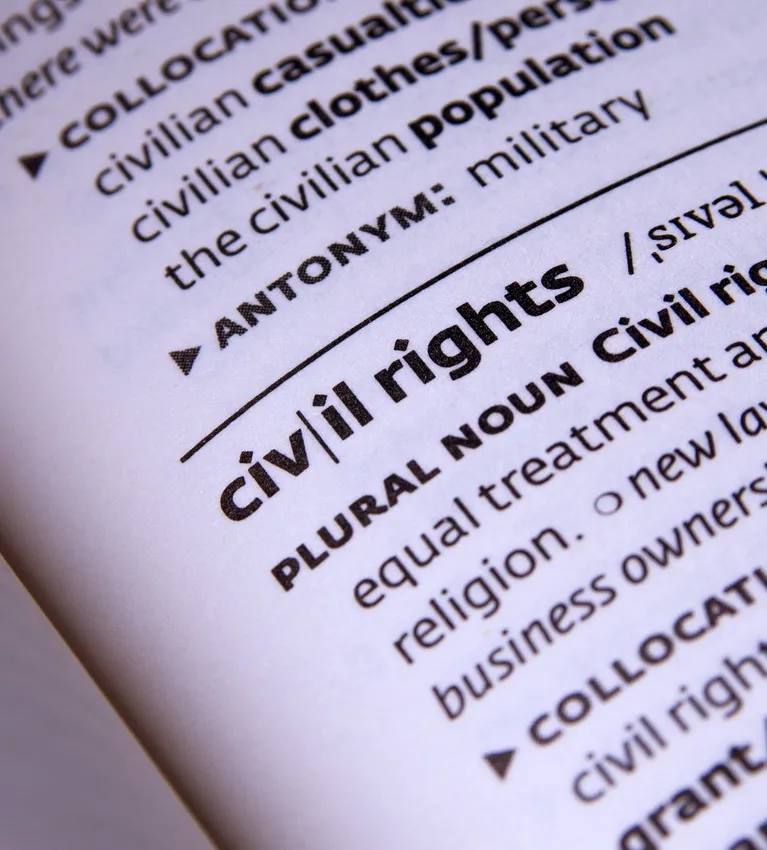 Close-up of a dictionary page showing the entry for "civil rights" in black text on white paper.