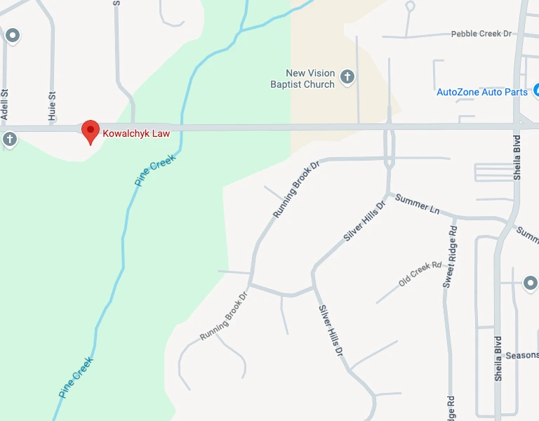 Map segment showing Kowalchyk Law near Pine Creek, New Vision Baptist Church, and AutoZone Auto Parts.